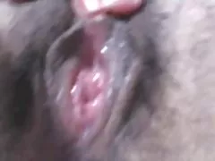 Figa bagnata e pelosa